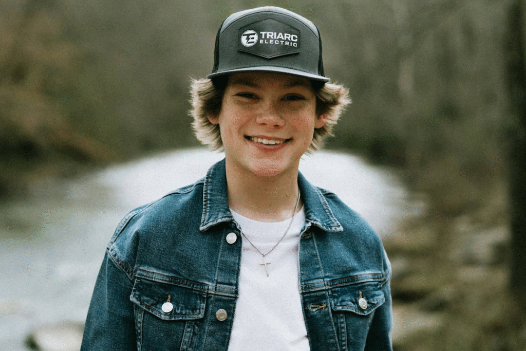 alt="Maddox Batson age and 2025 concert rehearsal backstage"
