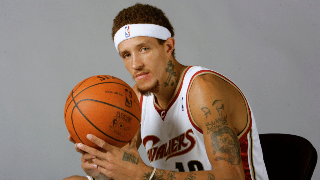 alt="Caressa Suzzette Madden smiling with Delonte West"