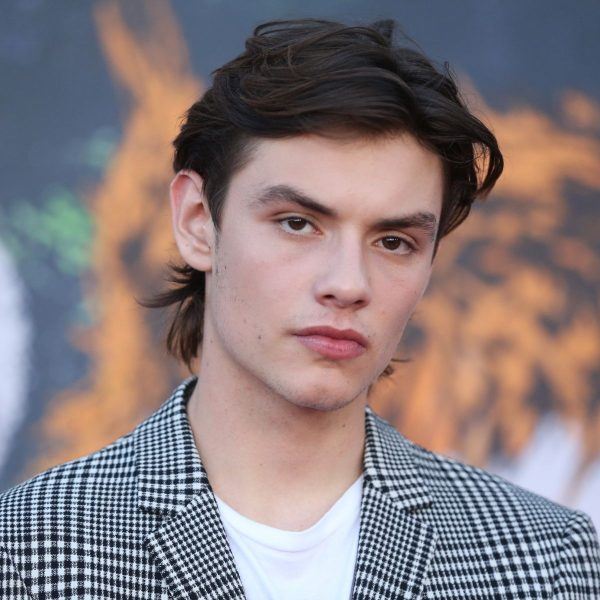 alt="Louis Partridge age in 2025 at a fan meet and greet event in London"

