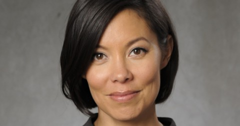 alt="Cy Kass speaking at TEDx 2025 event on personal branding"