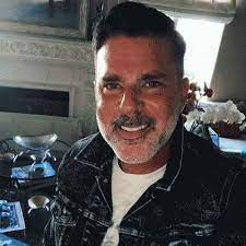 alt="Yasmine Bleeth with husband Paul Cerrito in 2025 smiling together"