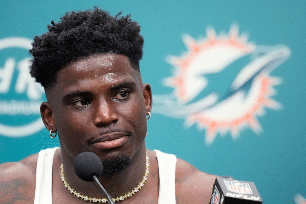 alt="Tyreek Hill jersey number 10 during Miami Dolphins 2025 game"