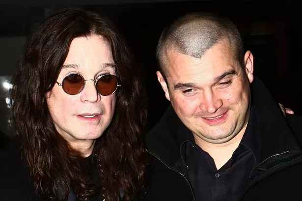alt="Louis Osbourne with his father Ozzy Osbourne in 2025"