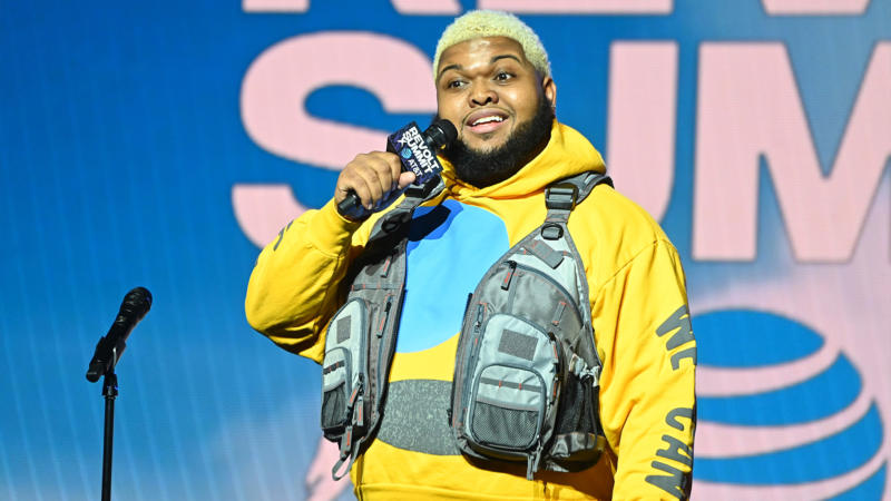 Druski performing live on stage during his comedy tour contributing to his net worth