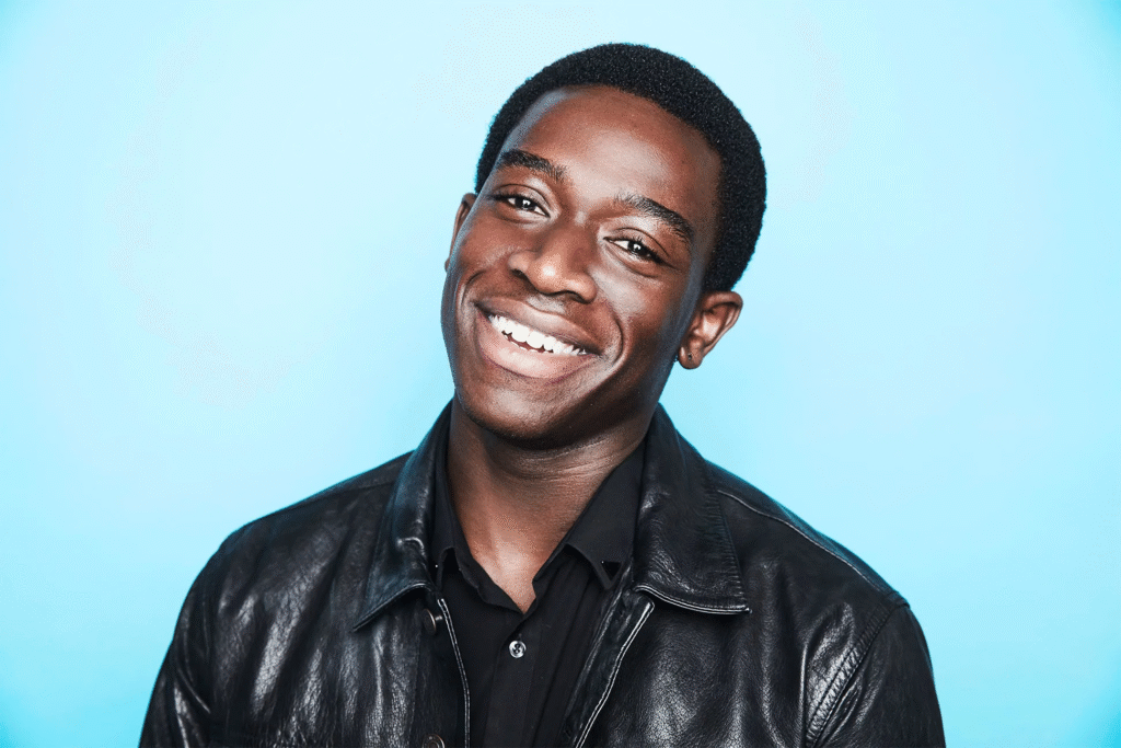 Damson Idris Net Worth 2025 — Damson Idris posing on the red carpet at an award event.