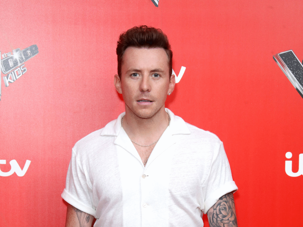 Danny Jones net worth growth illustrated through live performance on stage